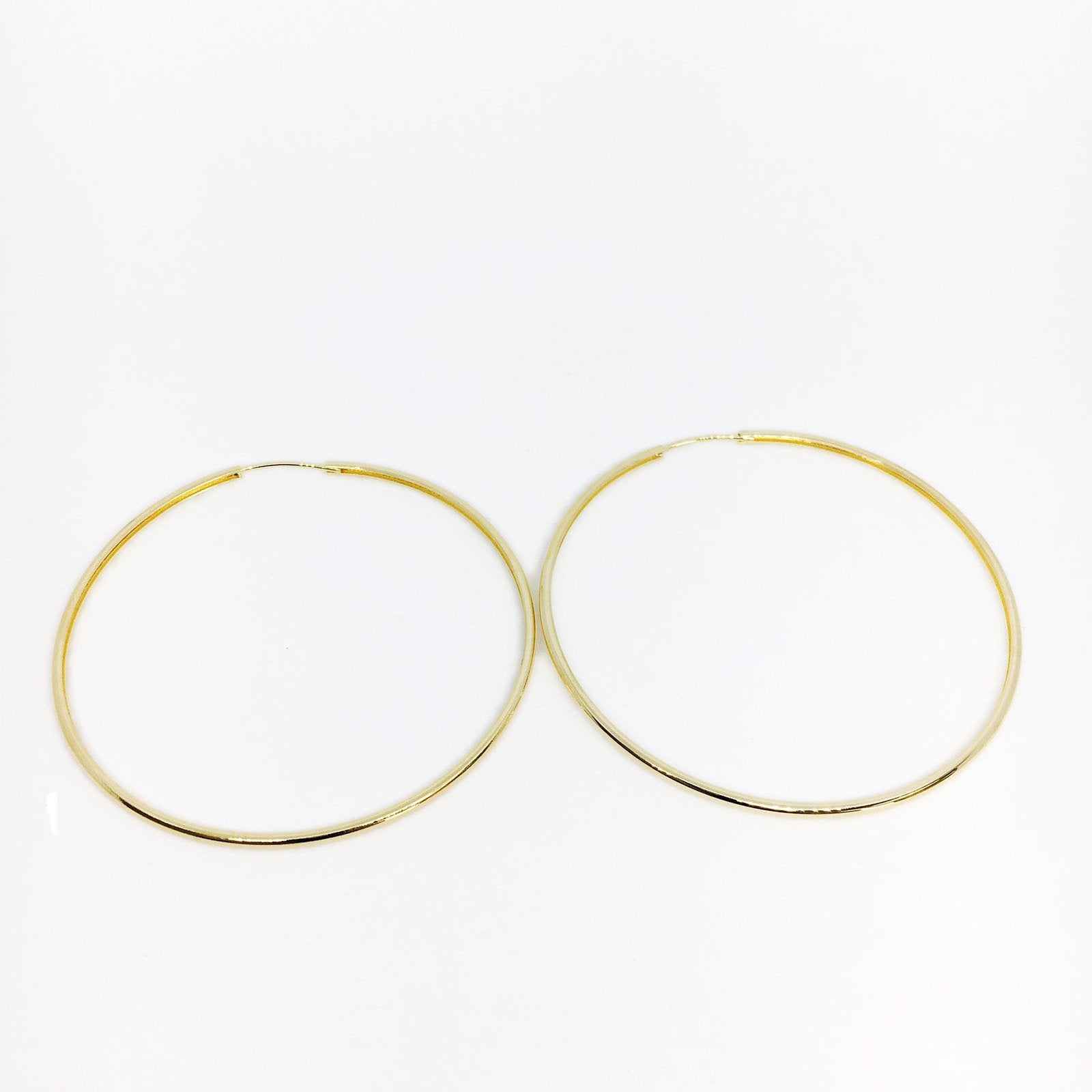 18KGL 50MM CONT HOOP - Donna Italiana ®