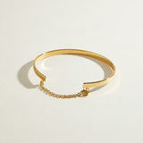 gold cuff bracelet, flat bangle bracelet, open cuff bracelet, minimalist gold bracelet, bracelet with chain closure, safety chain bracelet, stackable bangle, polished gold cuff, thin gold cuff bracelet, modern gold bracelet, everyday gold bracelet, wrist stack jewelry, gift for her