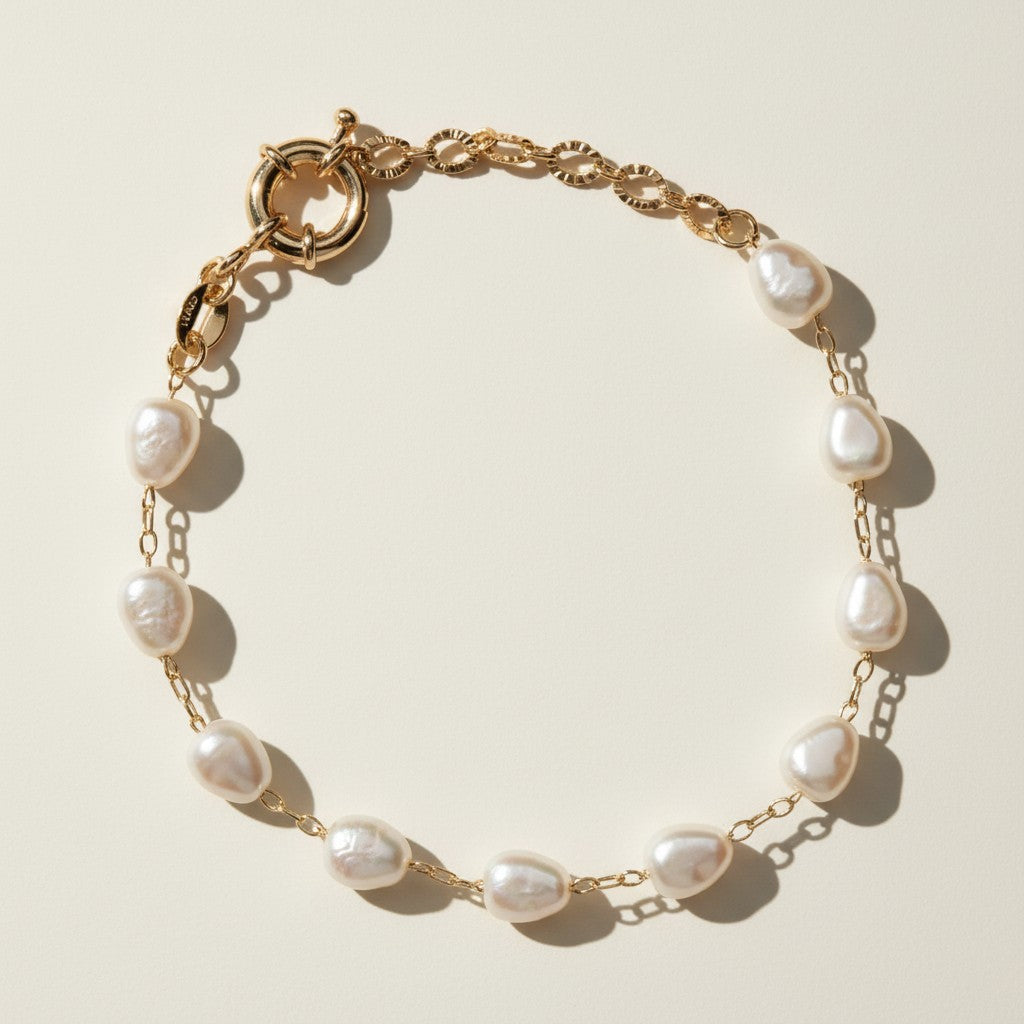baroque pearl bracelet flat lay, freshwater pearl bracelet, gold chain pearl bracelet, adjustable pearl bracelet clasp, handcrafted baroque pearl jewelry, pearl and gold chain bracelet, statement clasp pearl bracelet, organic pearl bracelet detail