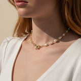 baroque pearl necklace, front toggle clasp necklace, freshwater pearl chain necklace, gold and pearl necklace on model, organic pearl necklace, statement clasp pearl necklace, dainty pearl choker, pearl necklace close-up