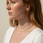 baroque pearl necklace, front toggle clasp necklace, freshwater pearl chain necklace, gold and pearl necklace on model, organic pearl necklace, statement clasp pearl necklace, dainty pearl choker, pearl necklace close-up