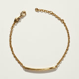 CZ bar bracelet flat lay, cubic zirconia bracelet detail, gold overlay bracelet construction, adjustable CZ bracelet clasp, sparkly bar bracelet, rolo chain CZ bracelet, minimalist gold bracelet, pave CZ bracelet closeup