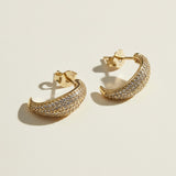 textured gold hoop earrings flat lay, pave dome hoop earrings, sparkly textured hoops detail, micro CZ gold hoops, stardust texture earrings, tapered gold huggie hoops, sugared gold earrings, statement pave hoops