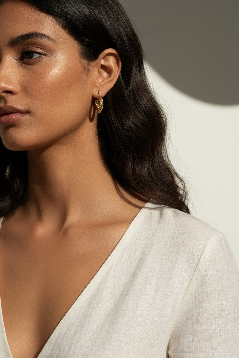 textured gold hoop earrings, feather texture hoops, 18K gold overlay hoops, small gold hoops on-model, sculptural hoop earrings, everyday gold hoops, organic texture earrings, chunky textured hoops