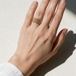 mesh dome ring on model, textured statement ring, perforated gold ring, split shank ring lifestyle, beaded texture ring on hand, sculptural gold ring, everyday statement jewelry