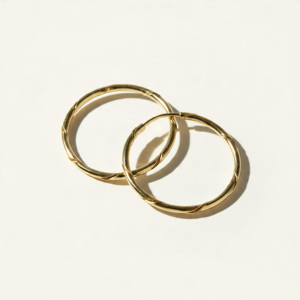 gold endless hoop earrings, textured gold hoops, diamond-cut hoop earrings, thin gold hoops, lightweight hoop earrings, twist hoop earrings, minimalist gold hoops, everyday hoop earrings, sleeper hoops, small and large gold hoops, hoop earrings size guide, women’s gold hoops
