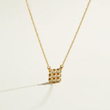 pave cluster pendant necklace, crystal pendant necklace detail, bezel set pendant, 18K gold overlay necklace, dainty crystal necklace, minimalist pendant necklace, sparkly pendant flat lay, cable chain necklace