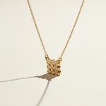 pave cluster pendant necklace, crystal pendant necklace detail, bezel set pendant, 18K gold overlay necklace, dainty crystal necklace, minimalist pendant necklace, sparkly pendant flat lay, cable chain necklace