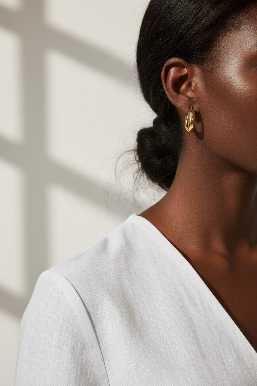 mini dome hoop earrings, small gold hoops on model, chunky mini hoops, rounded gold earrings, everyday small hoops, polished dome earrings, compact gold hoops, minimalist statement earrings