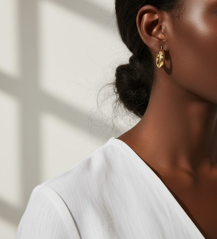 mini dome hoop earrings, small gold hoops on model, chunky mini hoops, rounded gold earrings, everyday small hoops, polished dome earrings, compact gold hoops, minimalist statement earrings