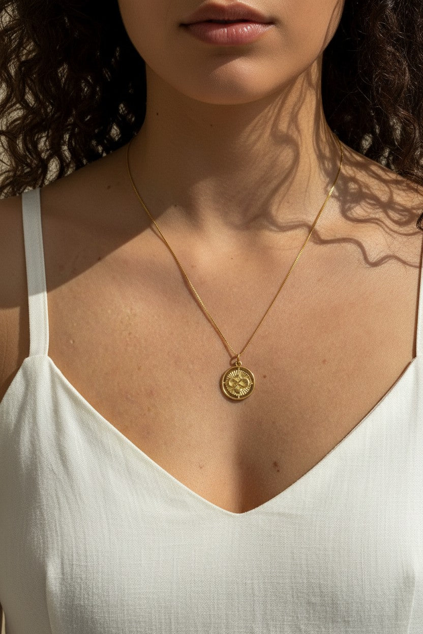 infinite love necklace, gold infinity pendant necklace, sunburst coin necklace, gold medallion necklace, heart and infinity jewelry, Donna Italiana jewelry, hypoallergenic gold necklace, layering necklace