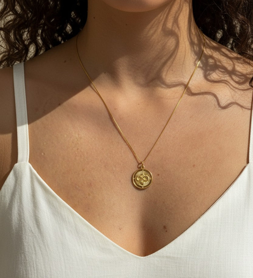 infinite love necklace, gold infinity pendant necklace, sunburst coin necklace, gold medallion necklace, heart and infinity jewelry, Donna Italiana jewelry, hypoallergenic gold necklace, layering necklace