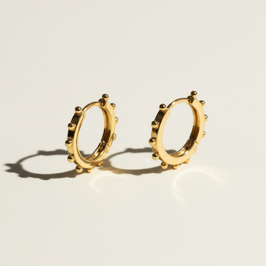 beaded hoop earrings, studded gold hoops, 18K gold overlay hoop earrings, textured hoop earrings, statement hoop earrings, small gold hoops, bead detail earrings, hoop earrings flat lay