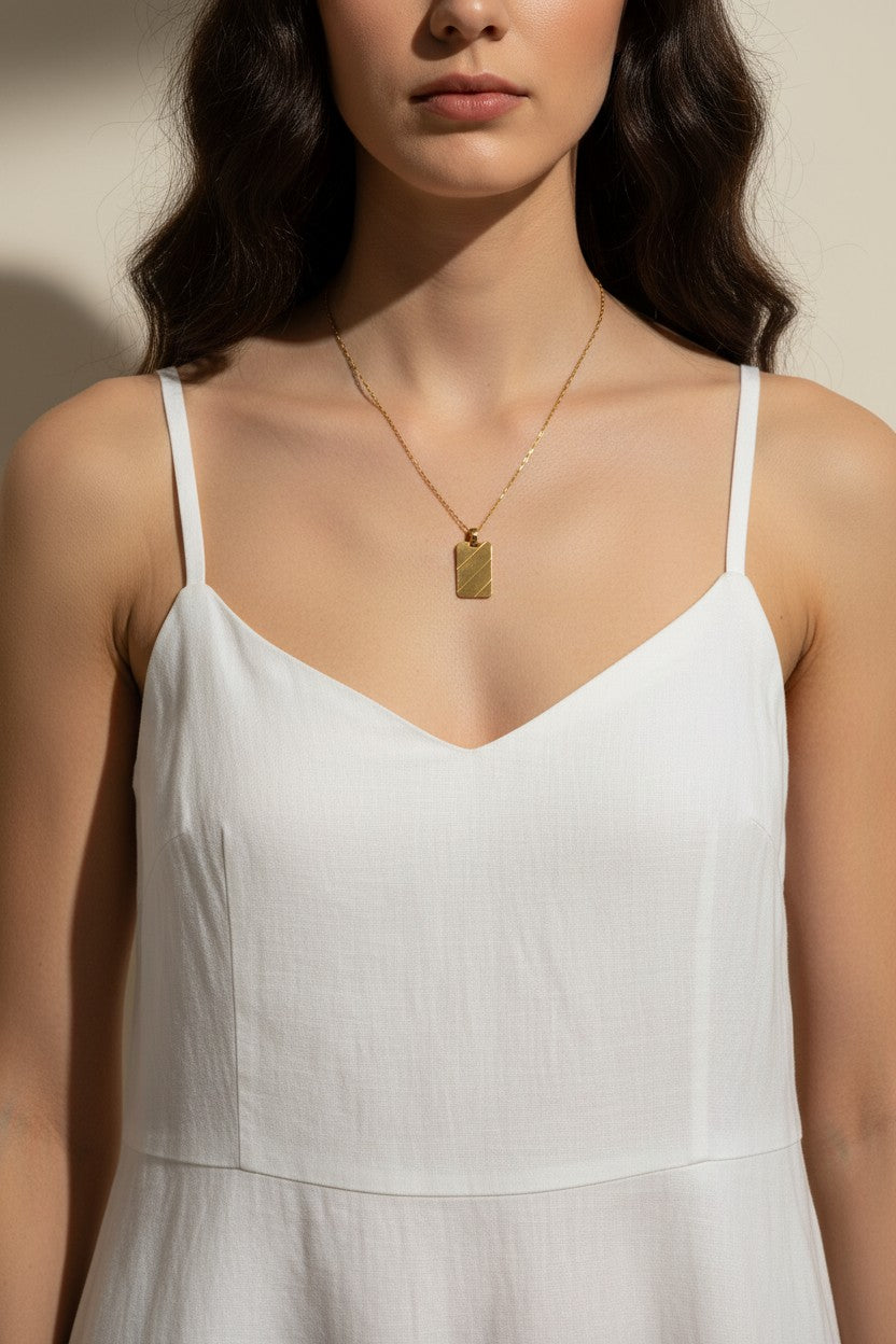 gold dog tag necklace, diagonal stripe pendant necklace, gold tag necklace, minimalist gold necklace, layering necklace, geometric pendant necklace, high polish gold jewelry, everyday gold necklace