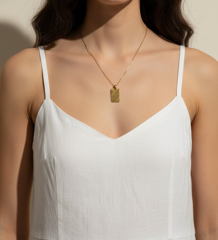 gold dog tag necklace, diagonal stripe pendant necklace, gold tag necklace, minimalist gold necklace, layering necklace, geometric pendant necklace, high polish gold jewelry, everyday gold necklace