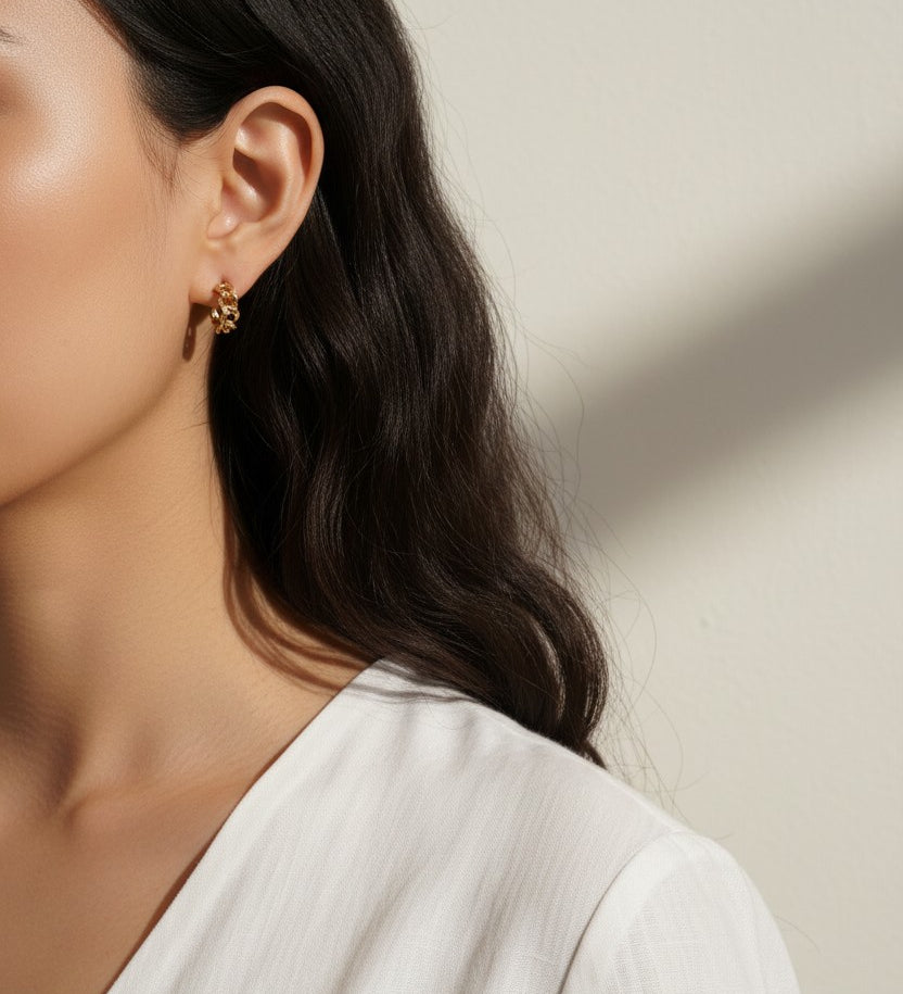 textured chain-link hoop earrings, gold chain hoop earrings on model, chunky textured hoops, small gold hoops styled, sculptural gold hoops, statement chain earrings, everyday textured hoops, gold link earrings