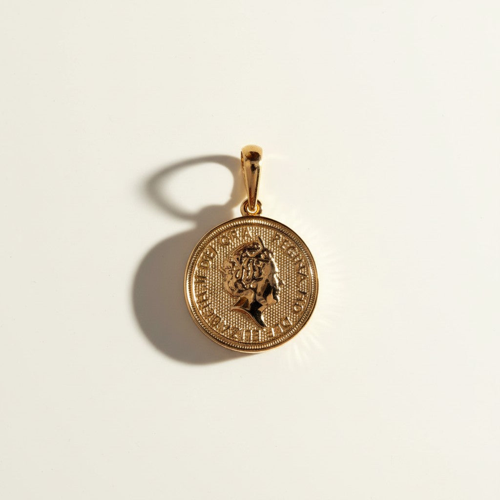 gold coin pendant, Queen Elizabeth coin necklace, vintage coin jewelry, medallion pendant gold, coin charm necklace, textured gold pendant, collectible coin jewelry, layering pendant