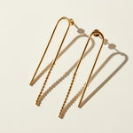 arch drop earrings, beaded wire earrings, gold U-shaped earrings, minimalist drop earrings, linear gold earrings, long wire earrings, geometric drop earrings, stud post drop earrings