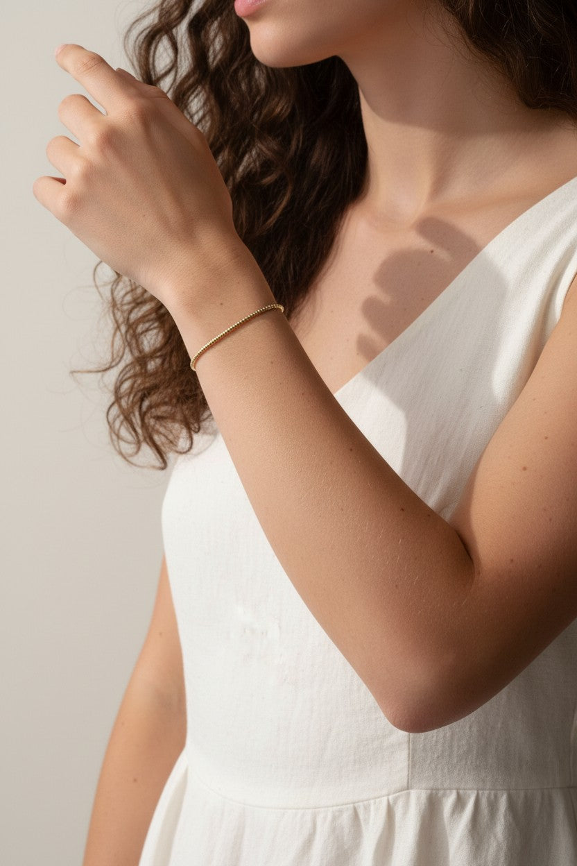 gold beaded bracelet, minimalist gold bracelet, dainty chain bracelet on model, textured gold bracelet, delicate beaded bracelet, everyday gold bracelet, layering bracelet gold, thin gold bracelet worn