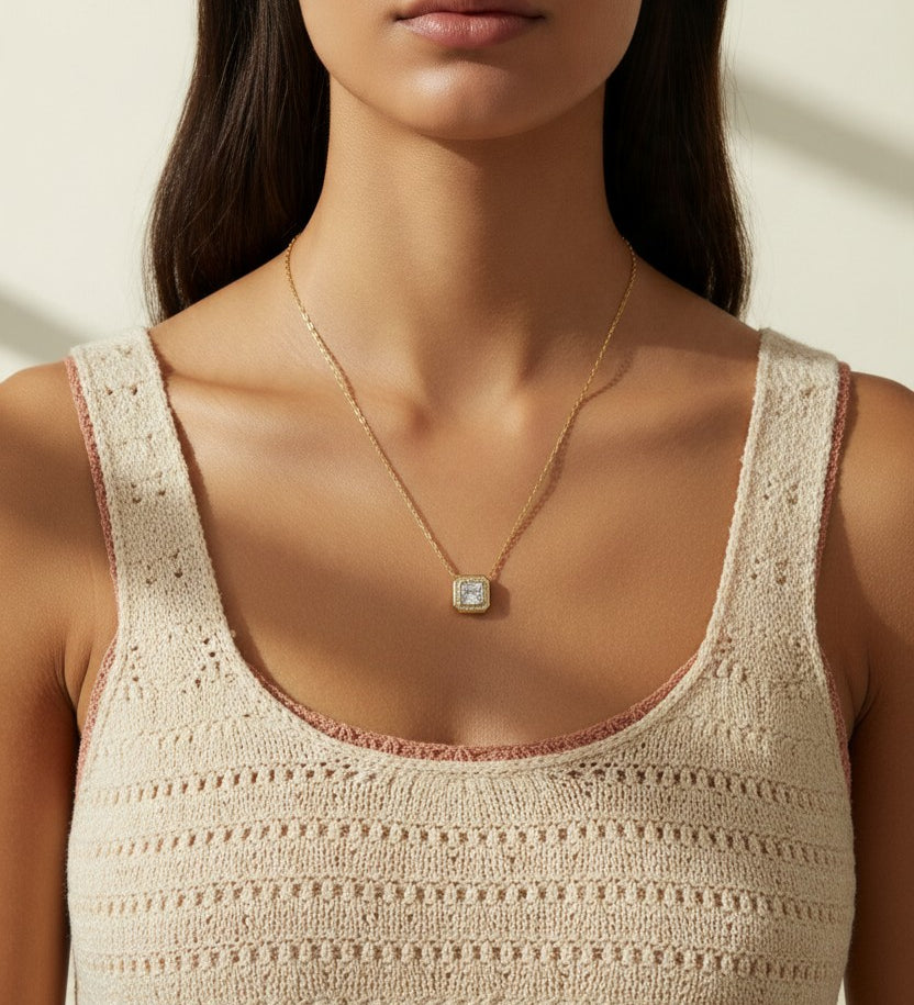 gold paperclip chain necklace, square halo pendant necklace, crystal pendant necklace on model, princess cut pendant necklace, pavé halo necklace, dainty gold necklace, gold-tone layering necklace, collarbone necklace, everyday gold necklace, minimalist pendant necklace, gift for her jewelry, scoop neck necklace