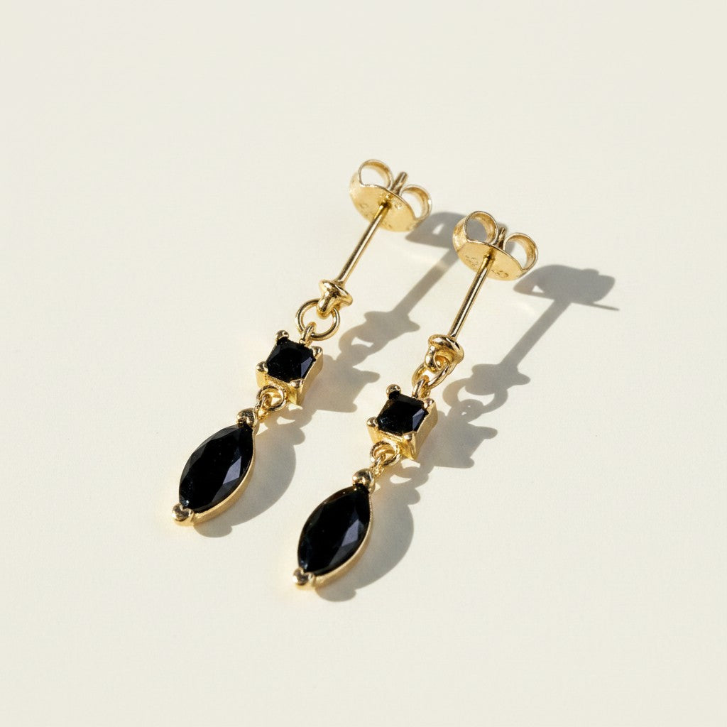gold drop earrings colored stone, emerald marquise earrings, black onyx drop earrings gold, statement dangle earrings, two-tone gemstone earrings, gold prong set earrings, marquise cut earrings