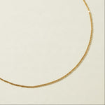 gold ball chain necklace, dainty bead chain necklace, faceted gold chain, diamond-cut bead chain, thin gold necklace, minimalist gold necklace, lobster clasp necklace, layering chain necklace, everyday gold necklace, delicate gold chain, sparkly gold chain, women’s gold necklac