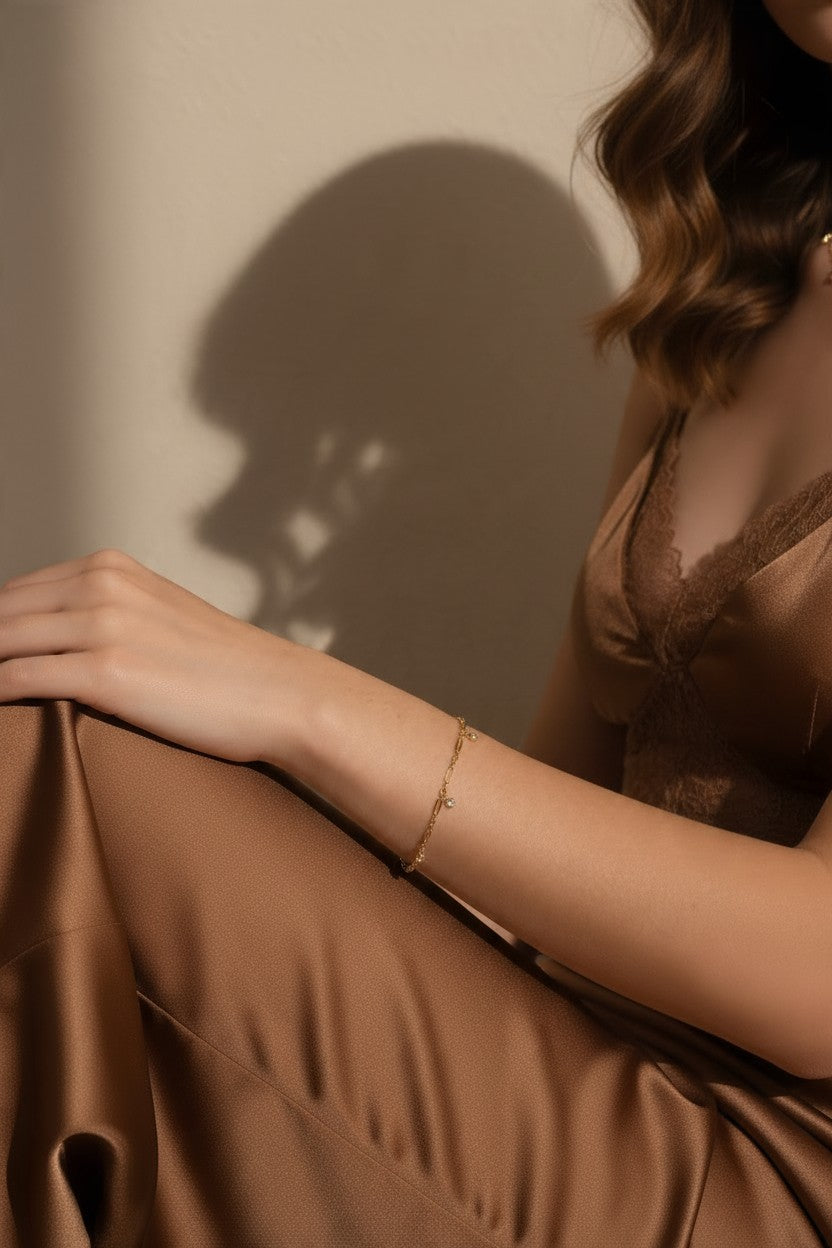 gold paperclip chain bracelet, crystal charm bracelet on wrist, dangling crystal bracelet, bezel crystal bracelet, gold-tone bracelet, dainty gold bracelet, station bracelet, adjustable gold bracelet, stacking bracelet, everyday gold bracelet, bridal party bracelet, gift for her jewelry