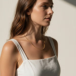 fine gold box chain necklace on model, thin gold chain necklace, dainty gold necklace, delicate box chain, layering chain necklace, collarbone necklace, minimalist gold necklace, everyday gold chain, simple gold chain necklace, lightweight gold necklace, summer linen style jewelry, gift for her