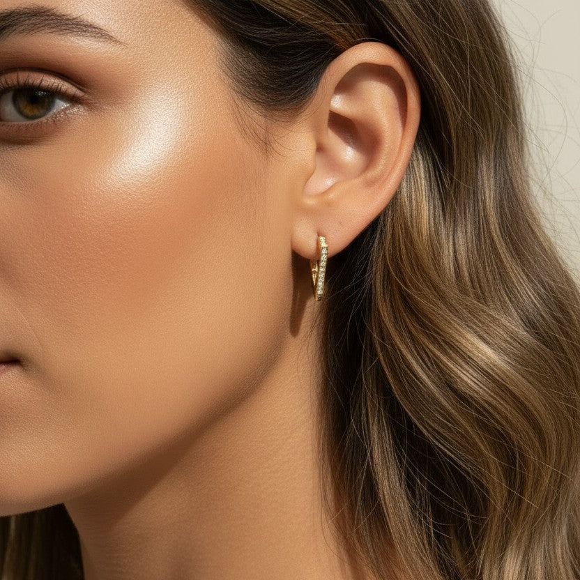  gold triangle huggie earrings, geometric pave earrings, angular gold hoop earrings, crystal huggie hoops, statement geometric earrings gold, modern triangle earrings, pave crystal huggies