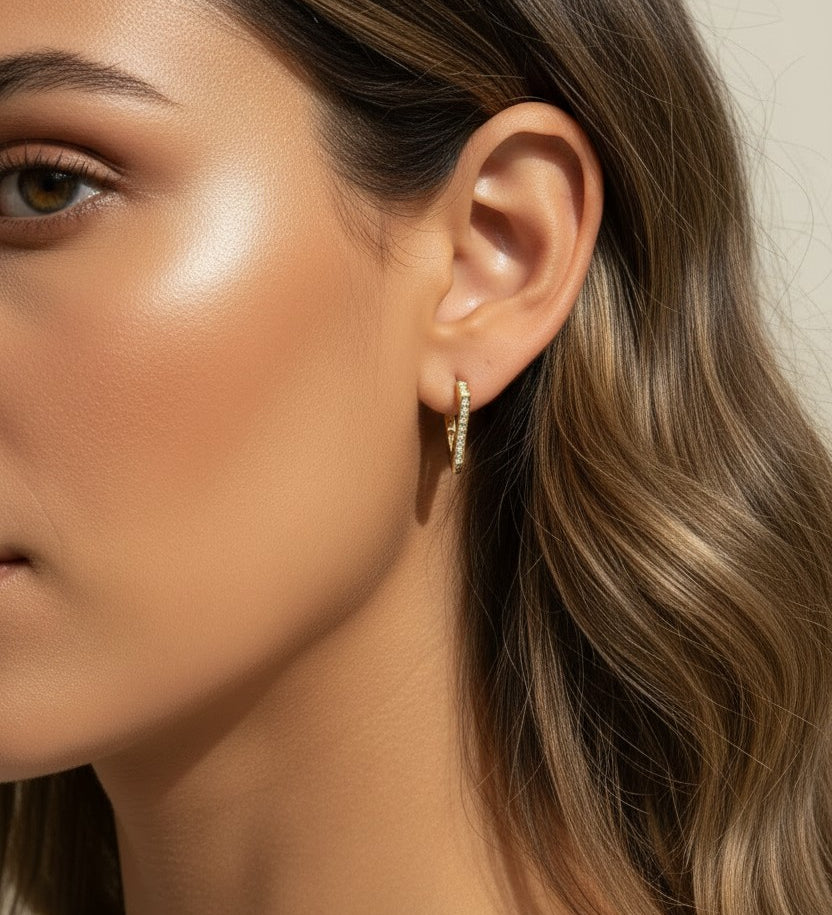  gold triangle huggie earrings, geometric pave earrings, angular gold hoop earrings, crystal huggie hoops, statement geometric earrings gold, modern triangle earrings, pave crystal huggies