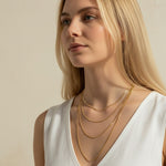 mariner chain necklace on-model, anchor link necklace gold, 18K gold overlay chain, nautical chain necklace, layered mariner chain, statement link necklace, textured gold chain, mariner necklace close-up