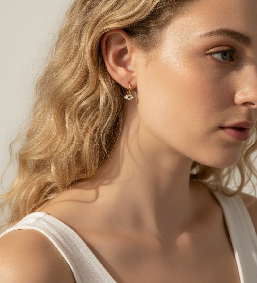 evil eye hoop earrings, gold evil eye charm earrings, 18k gold overlay hoops, pave cubic zirconia earrings, Donna Italiana jewelry, hypoallergenic gold earrings, waterproof gold jewelry, small gold hoop earrings, dainty charm hoops