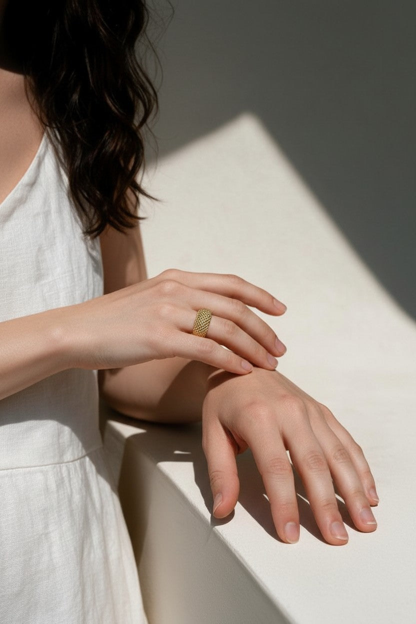 mesh dome ring on model, textured statement ring, perforated gold ring, split shank ring lifestyle, beaded texture ring on hand, sculptural gold ring, everyday statement jewelry
