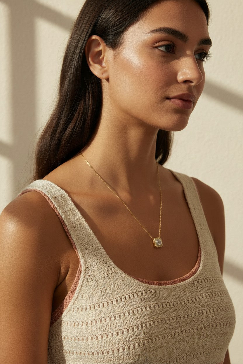 gold paperclip chain necklace, square halo pendant necklace, crystal pendant necklace on model, princess cut pendant necklace, pavé halo necklace, dainty gold necklace, gold-tone layering necklace, collarbone necklace, everyday gold necklace, minimalist pendant necklace, gift for her jewelry, scoop neck necklace