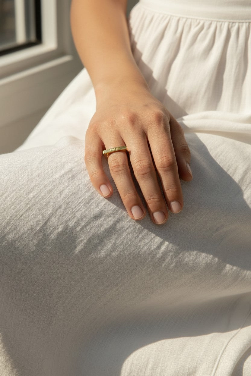 faith ring, word signet ring, engraved gold ring, inspirational jewelry, gold statement ring, personalized word ring, on-model ring photography, meaningful jewelry gift