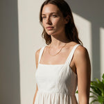 fine gold box chain necklace on model, thin gold chain necklace, dainty gold necklace, delicate box chain, layering chain necklace, collarbone necklace, minimalist gold necklace, everyday gold chain, simple gold chain necklace, lightweight gold necklace, summer linen style jewelry, gift for her
