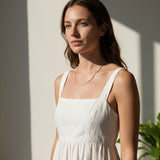 fine gold box chain necklace on model, thin gold chain necklace, dainty gold necklace, delicate box chain, layering chain necklace, collarbone necklace, minimalist gold necklace, everyday gold chain, simple gold chain necklace, lightweight gold necklace, summer linen style jewelry, gift for her