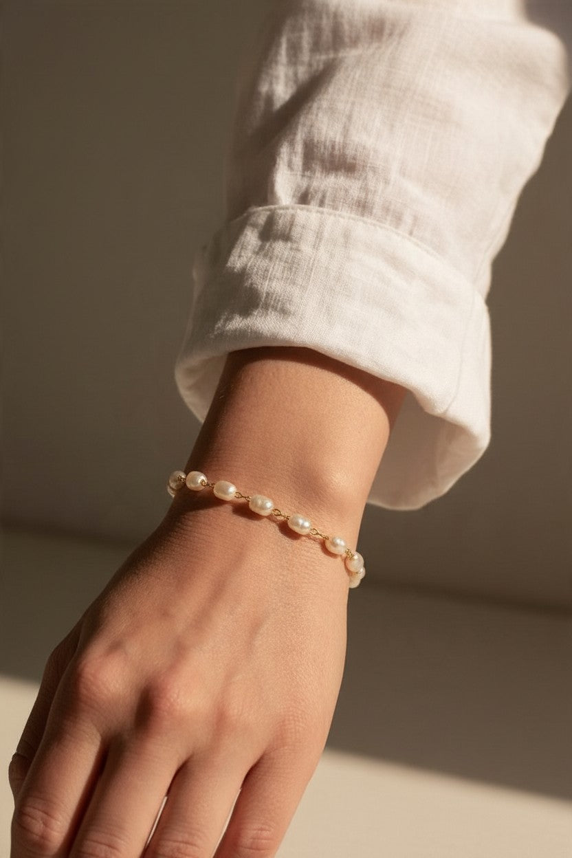pearl station bracelet, wire wrapped pearl bracelet, oval pearl bracelet, gold and pearl bracelet, dainty pearl bracelet, adjustable pearl bracelet, rice pearl bracelet, lobster clasp pearl bracelet, bridal pearl bracelet, everyday pearl bracelet, layering bracelet, women’s pearl bracelet