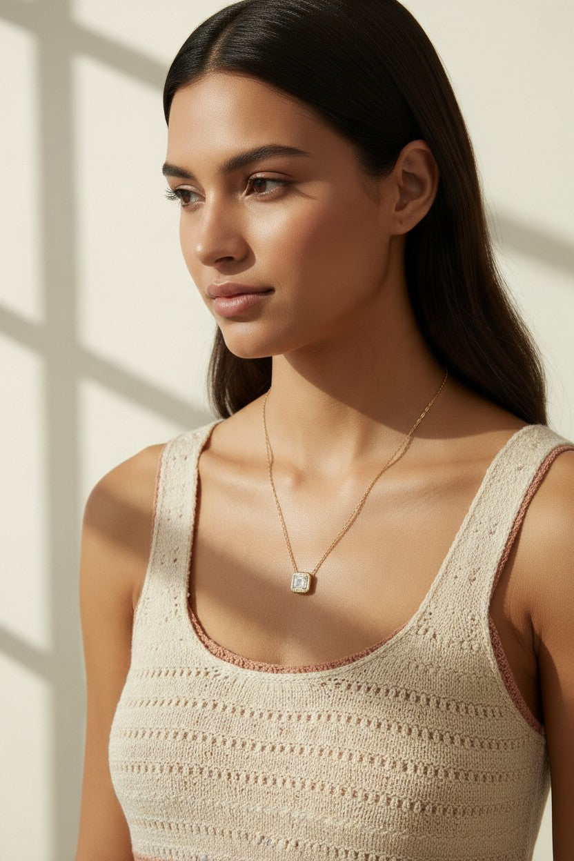 gold paperclip chain necklace, square halo pendant necklace, crystal pendant necklace on model, princess cut pendant necklace, pavé halo necklace, dainty gold necklace, gold-tone layering necklace, collarbone necklace, everyday gold necklace, minimalist pendant necklace, gift for her jewelry, scoop neck necklace