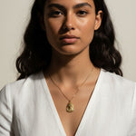 gold pharaoh necklace, Egyptian mask pendant necklace, King Tut necklace, statement gold necklace, Egyptian jewelry, textured gold necklace, historical pendant necklace, on-model necklace photography