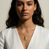 gold pharaoh necklace, Egyptian mask pendant necklace, King Tut necklace, statement gold necklace, Egyptian jewelry, textured gold necklace, historical pendant necklace, on-model necklace photography