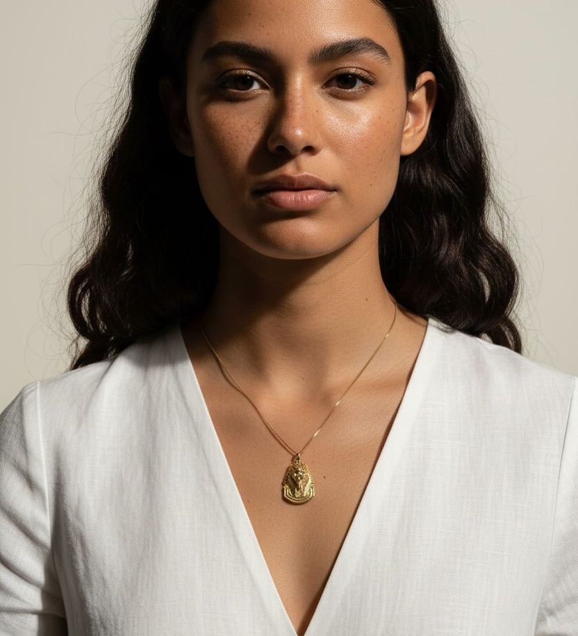 gold pharaoh necklace, Egyptian mask pendant necklace, King Tut necklace, statement gold necklace, Egyptian jewelry, textured gold necklace, historical pendant necklace, on-model necklace photography