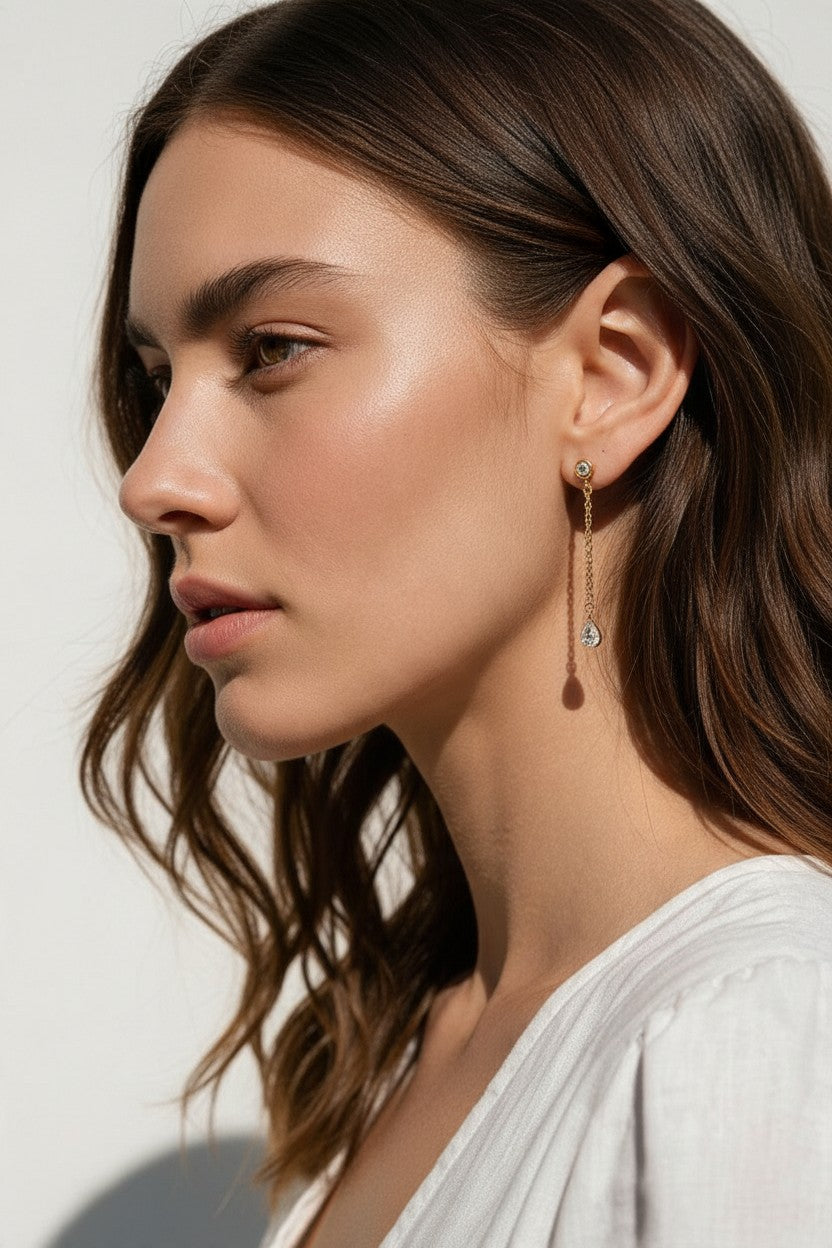gold chain drop earrings, pear drop earrings, crystal drop stud earrings, dainty dangle earrings, bridal drop earrings, teardrop crystal earrings, gold chain dangle earrings, cubic zirconia drop earrings, delicate gold earrings, wedding earrings, elegant everyday earrings, women’s drop earrings