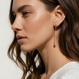 gold chain drop earrings, pear drop earrings, crystal drop stud earrings, dainty dangle earrings, bridal drop earrings, teardrop crystal earrings, gold chain dangle earrings, cubic zirconia drop earrings, delicate gold earrings, wedding earrings, elegant everyday earrings, women’s drop earrings