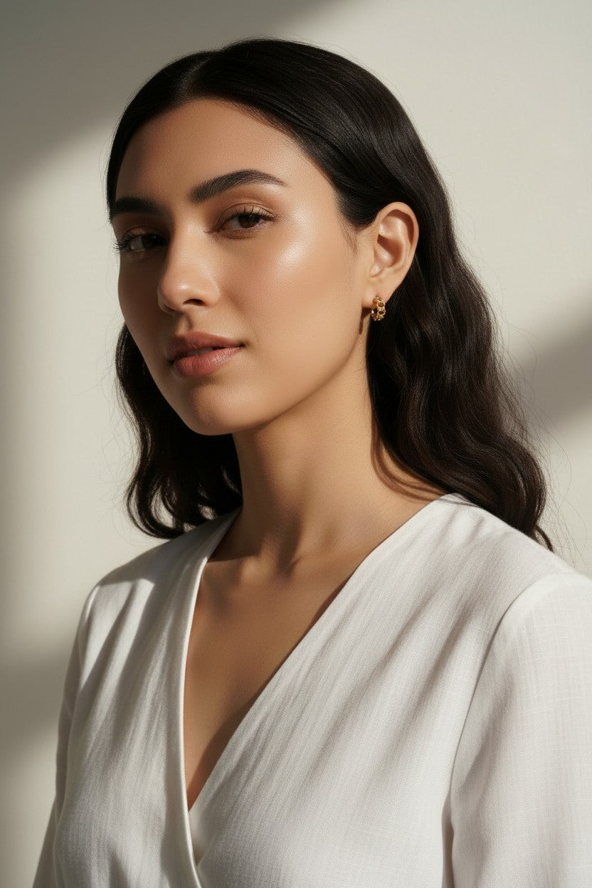 textured chain-link hoop earrings, gold chain hoop earrings on model, chunky textured hoops, small gold hoops styled, sculptural gold hoops, statement chain earrings, everyday textured hoops, gold link earrings