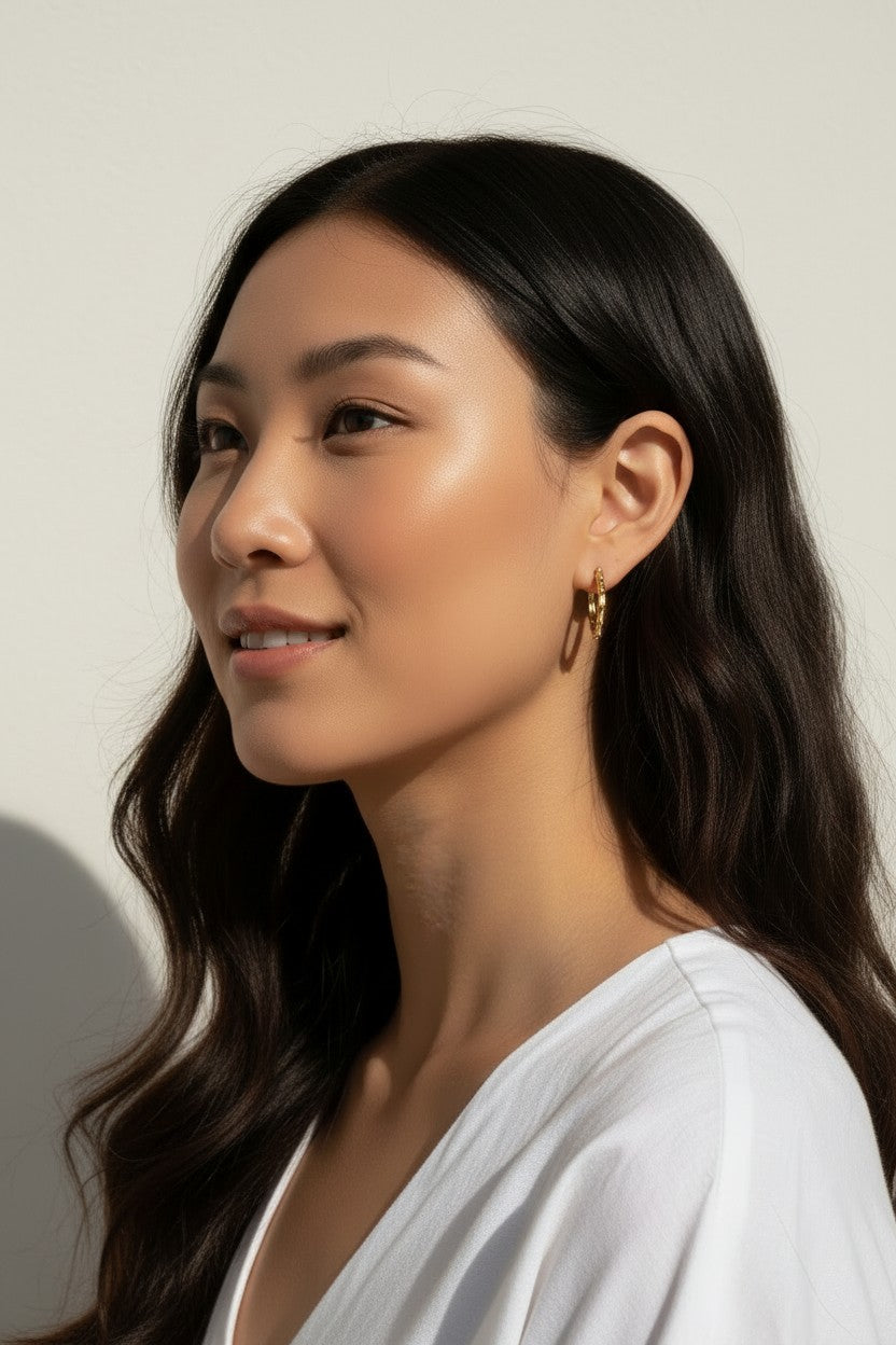 twisted rope hoop earrings, gold twist hoops on-model, 18K gold overlay hoops, small textured hoops, everyday gold hoops, rope texture earrings, dainty hoop earrings, twist hoop jewelry