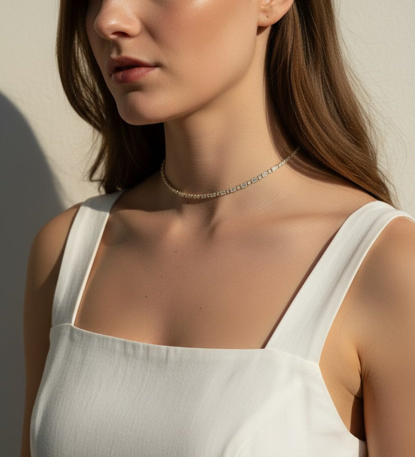 CZ tennis choker on model, baguette round cut necklace, sparkly choker close-up, stainless steel tennis necklace, cubic zirconia choker on model, statement choker necklace, layering CZ necklace, glamorous choker photo