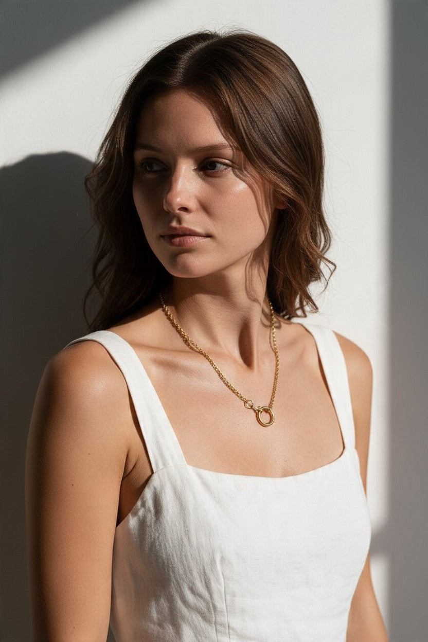 gold rolo chain necklace on model, round clasp necklace, charm holder necklace, spring ring clasp necklace, gold chain with ring clasp, modern gold chain necklace, front clasp necklace, layering chain necklace, everyday gold necklace, minimalist gold necklace, interchangeable pendant necklace, women’s gold chain necklace