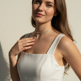 CZ tennis choker on model, baguette round cut necklace, sparkly choker close-up, stainless steel tennis necklace, cubic zirconia choker on model, statement choker necklace, layering CZ necklace, glamorous choker photo