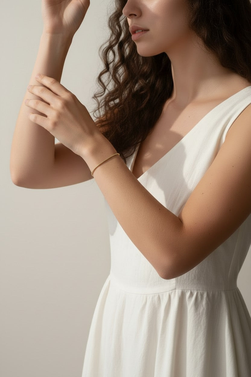 gold beaded bracelet, minimalist gold bracelet, dainty chain bracelet on model, textured gold bracelet, delicate beaded bracelet, everyday gold bracelet, layering bracelet gold, thin gold bracelet worn